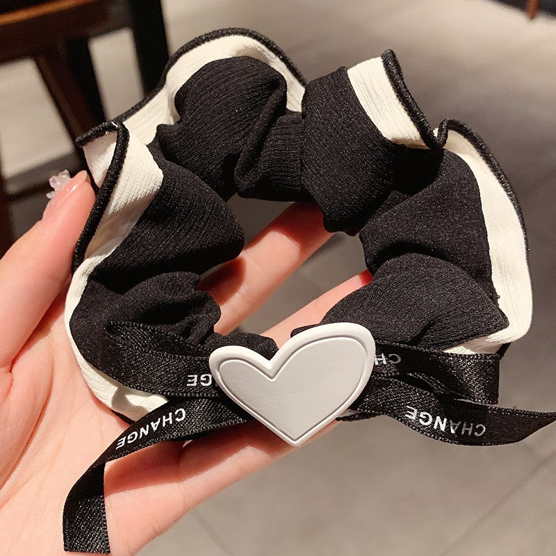 Bow knot peach heart hair rope PL52302