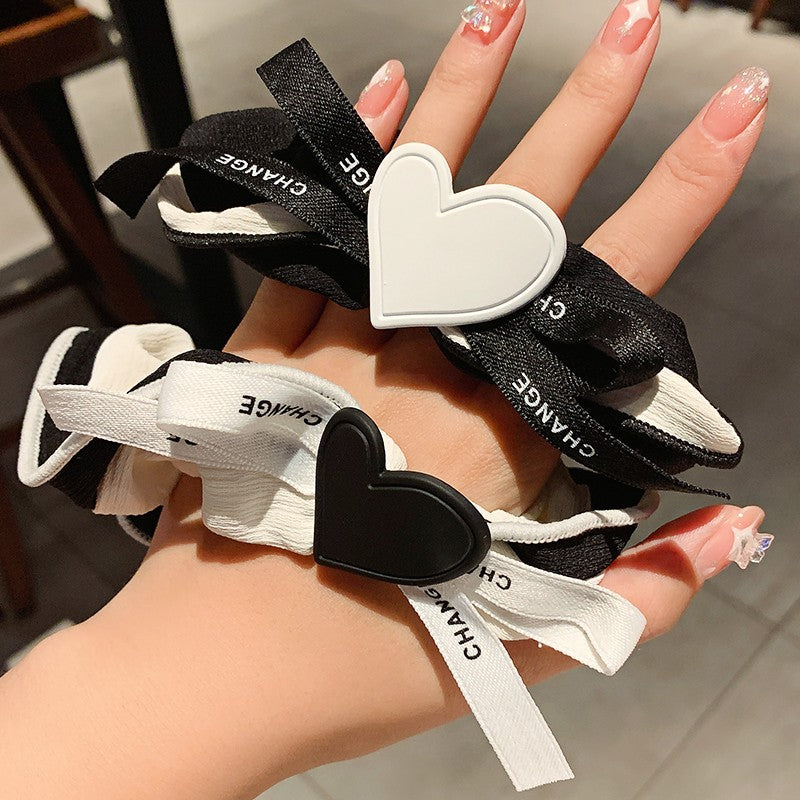 Bow knot peach heart hair rope PL52302