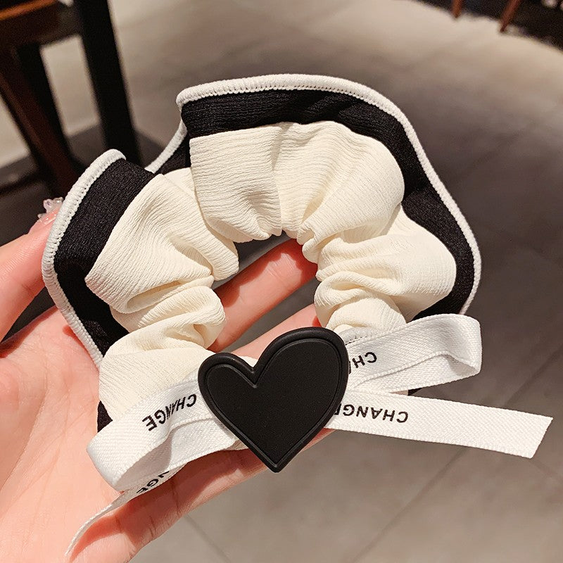 Bow knot peach heart hair rope PL52302