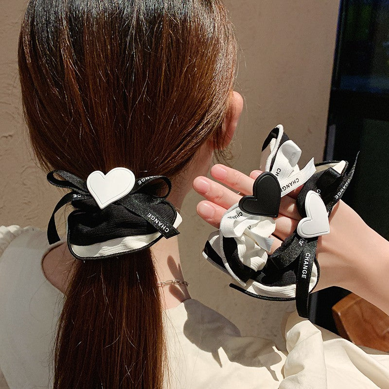 Bow knot peach heart hair rope PL52302