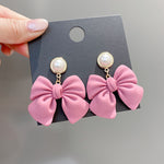 Loved pink bow earrings PL51901