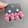 Loved pink bow earrings PL51901