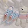 Powder blue canvas shoes PL51084